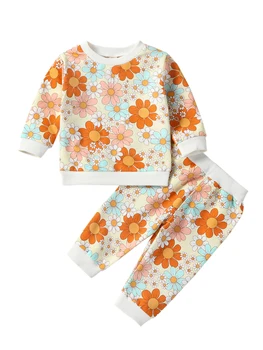 Комплект пуловери и панталони за малки момичета с хубав цветен модел за стилни есенно-зимни премени
